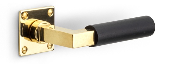 1930MRV45 - unsprung lever handle on rose brass unlacquered/ebony wood