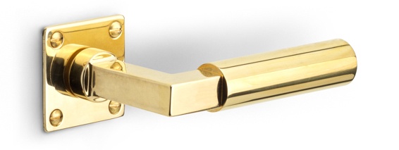 1930MRV45 - unsprung lever handle on rose brass unlacquered